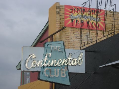 1996 Ford Bronco - A vintage neon sign for The Continental Club is visible below a Southside Tattoo sign.
