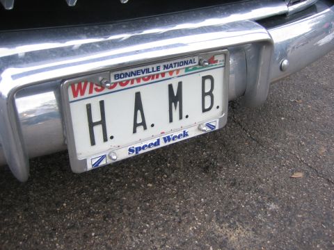 1996 Ford Bronco - A close-up of a vehicle's rear bumper and license plate frame, showing a Wisconsin plate.