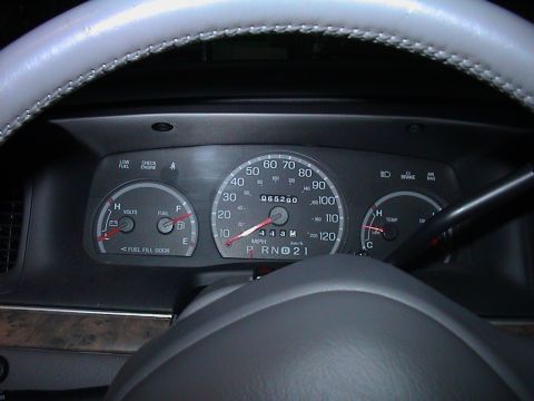 2000 Ford Crown Victoria - Interior view of a car's dashboard gauges, including speedometer, fuel, and temperature indicators.