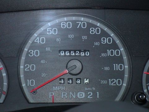 2000 Ford Crown Victoria - The odometer displays 65,290 miles on this vehicle's dashboard.