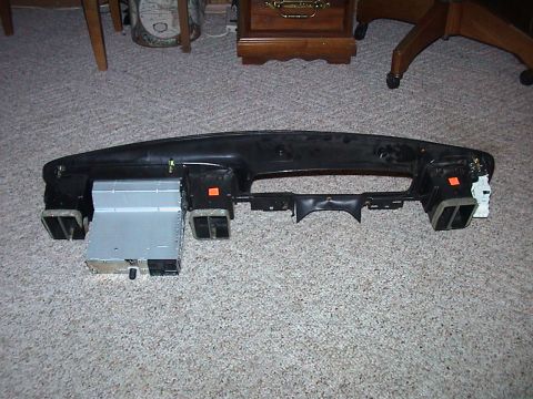 2000 Ford Crown Victoria - Dashboard assembly with integrated radio and air vents, removed from a vehicle.