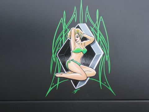 1996 Ford Bronco - Custom artwork a pin-up girl adorns the side of a vehicle.