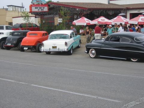 1996 Ford Bronco - A classic 1956 Chevrolet Bel Air is parked in front of Doc's restaurant.