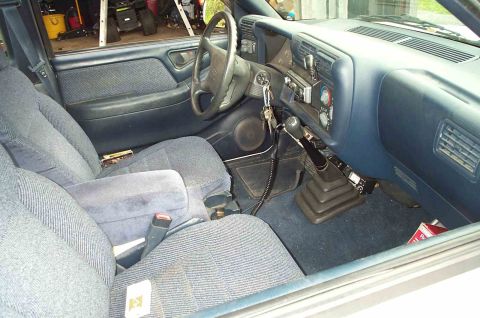 1988 Ford Bronco - Interior view of a pickup truck, focusing on the driver's side and dashboard.