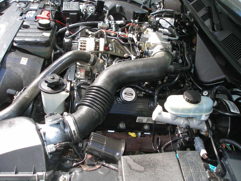 The white overspray was applied sometime during its in-service days.