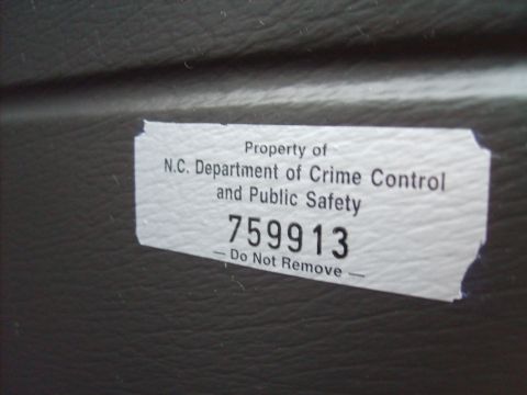 2004 Ford Crown Victoria - Sticker indicates property of N.C. Department of Crime Control and Public Safety with an inventory number.