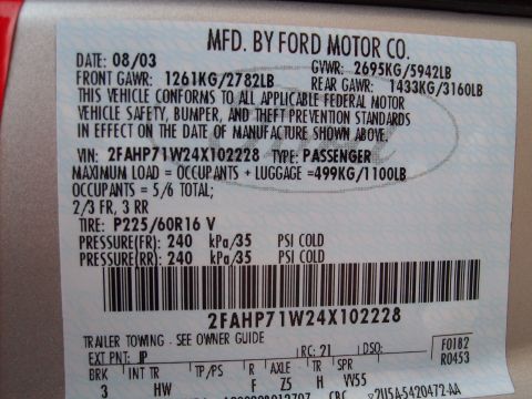 2004 Ford Crown Victoria - This sticker shows the vehicle's manufacturing date as August 2003 and its VIN.