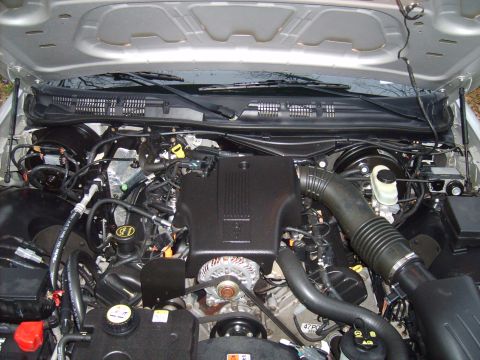 2004 Ford Crown Victoria - Engine bay of a 2004 Ford Crown Victoria, showing the V8 engine and associated components.