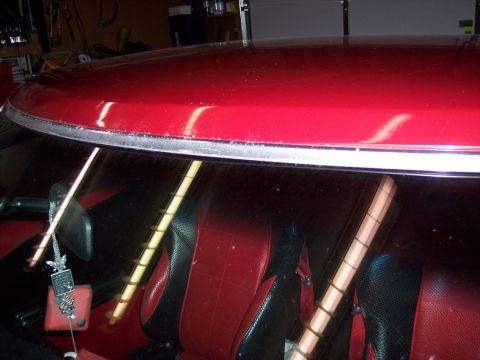 1972 Ford Ranchero - Interior view of a red vehicle, showing the seats and windshield trim.