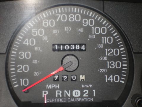 2001 Ford Crown Victoria - The speedometer shows 110,384 miles and indicates 'Certified Calibration' below the gear selector.