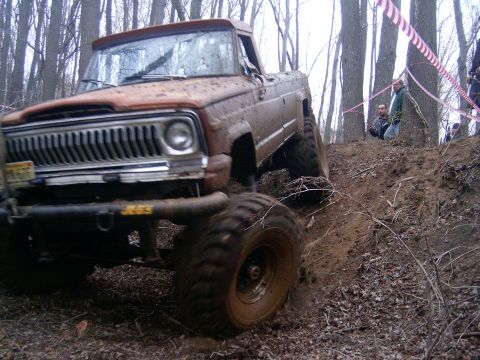 1979 Jeep J-10 - This 1979 Jeep J-10 navigates a challenging off-road course.