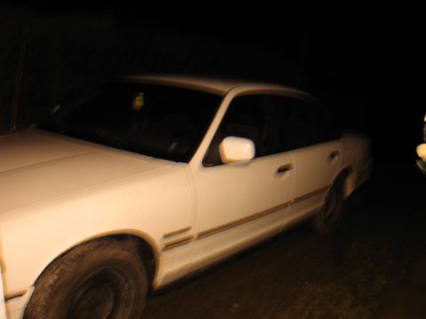 1992 Ford Crown Victoria - Side view of a white 1992 Ford Crown Victoria sedan.