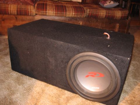 1992 Ford Crown Victoria - Alpine R-Series subwoofer box shown indoors, likely for car audio installation.