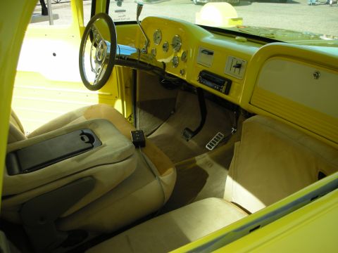 1998 Ford Crown Victoria - Custom interior of a classic truck, a bright yellow dashboard and tan upholstery.
