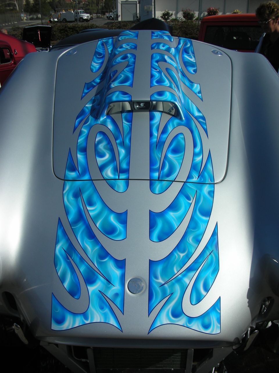 Silver hood with elaborate blue tribal flame airbrush artwork