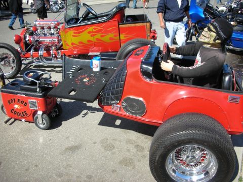 1998 Ford Crown Victoria - A custom hot rod with a skeleton driver and a matching cooler is on display.