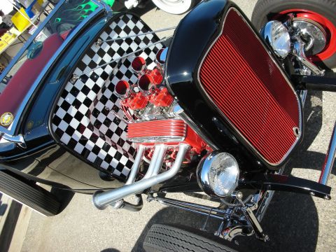 1998 Ford Crown Victoria - A custom hot rod features a powerful V8 engine and a distinctive checkered interior pattern.