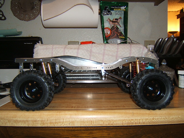 RC car chassis with large tires and suspension