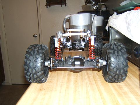 1988 Ford Bronco - RC crawler chassis with large tires and suspension components visible.