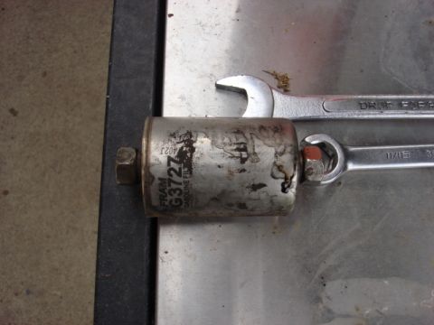 1983 Ford Bronco - Here was the old filter it was a fram part # G3727. I disposed the filter the way my local law said (drain out all fuel and let air perge t…