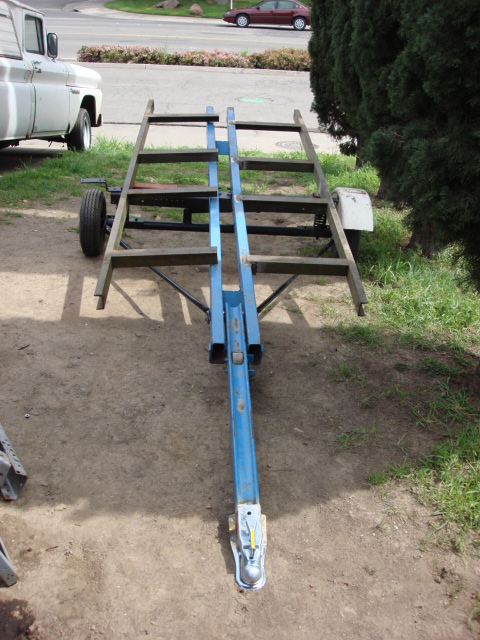 1983 Ford Bronco - i had this steel shelf sitting on the side of the house and it was 42" wide so i chopped in half. I welding it to the center bars.