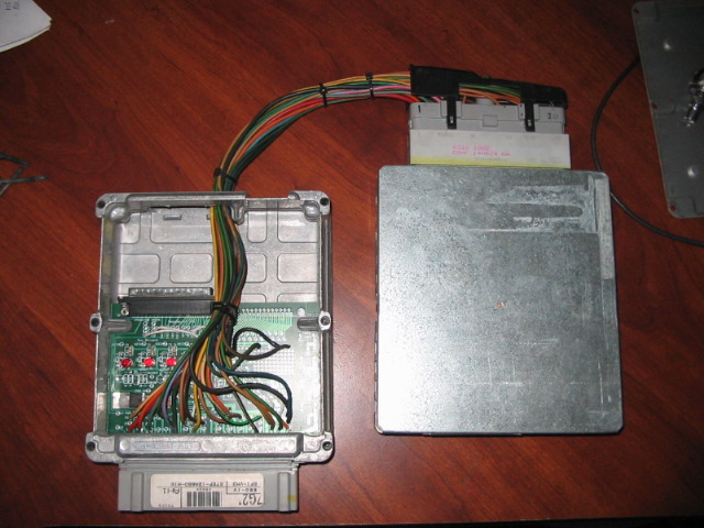 Engine control unit with wiring harness and connectors