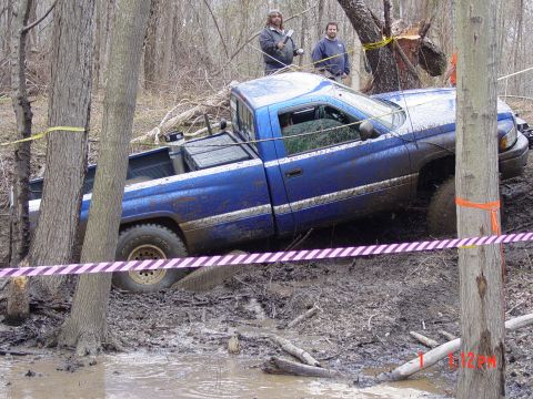1995 Dodge 1500 - Blue Dodge 1500 stuck in mud during an off-road event.