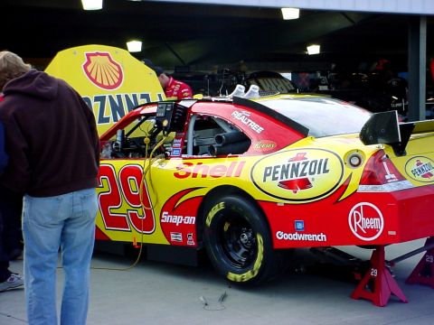1993 Ford Mustang - A race car with the number 29 and Pennzoil sponsorship is seen in the pits.