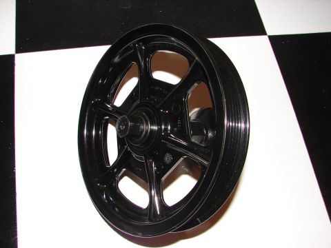 1992 Ford Taurus - A black pulley wheel with a five-spoke design is shown against a black and white checkered background.