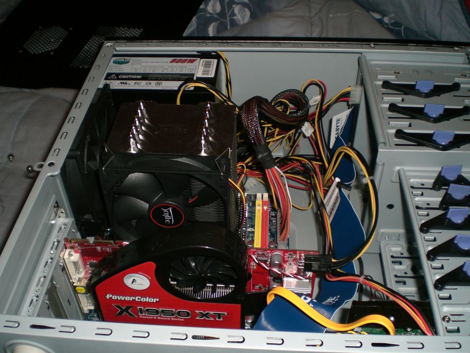 Inside a desktop PC case showing PowerColor X1950 XT graphics card
