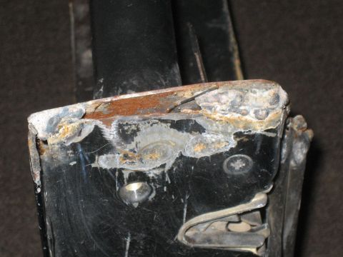 1995 Ford Bronco - This photo shows a corroded metal bracket, not a 1995 Ford Bronco.