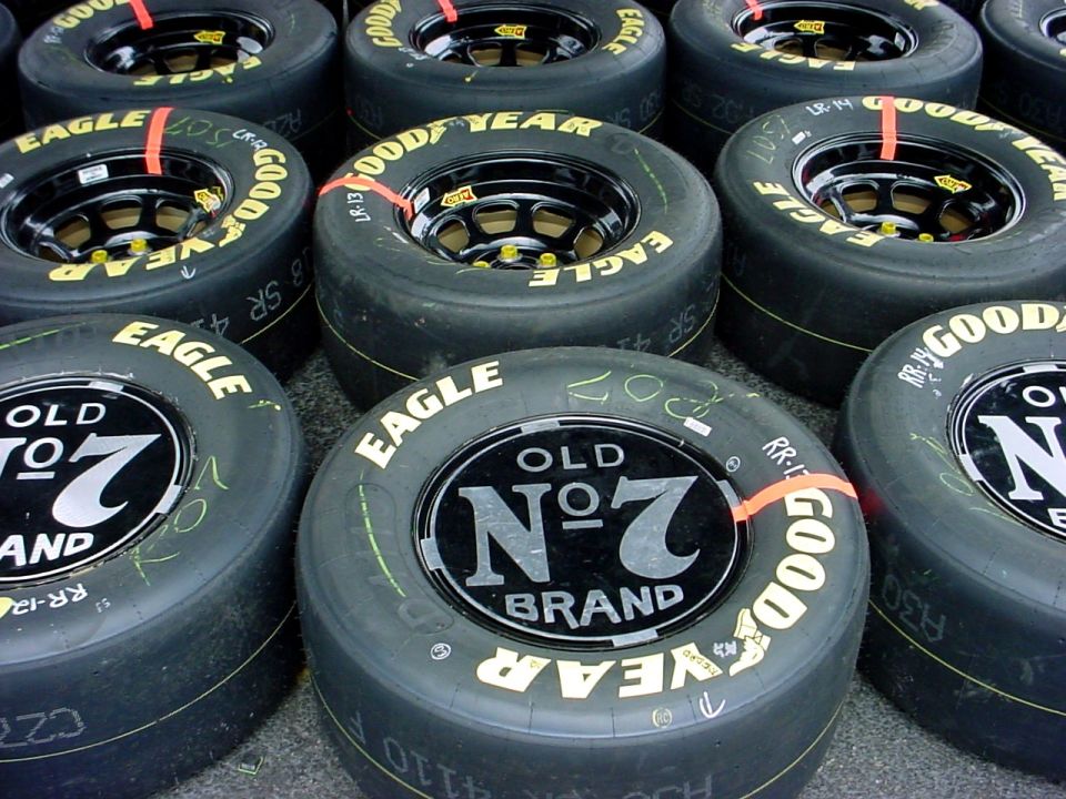 Racing tires with Old No. 7 Brand logos and Goodyear Eagle branding