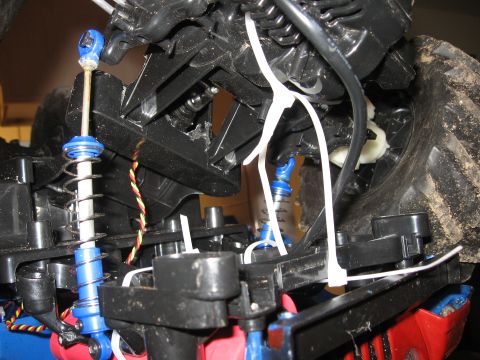1990 Ford Bronco - Suspension components and wiring detail on a remote control car.