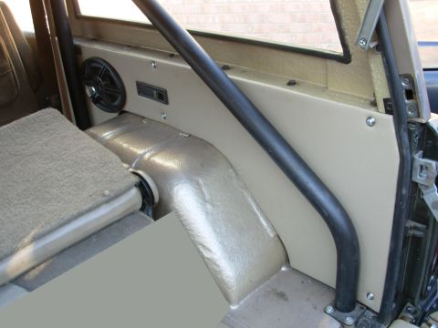 1975 Ford Bronco - This one's upholstery is tighter, but the panel doesn't fit as well as the L side. Oh, well - you can't win 'em all. The carpet will hide i…