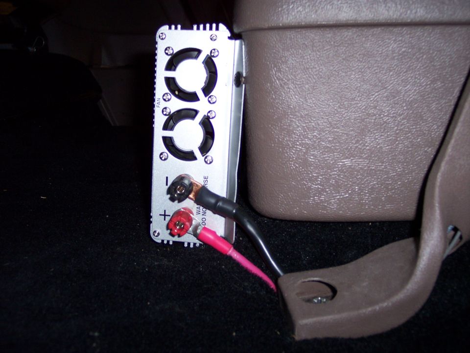 6 ga. power cables grounded to the seat belt anchor bolt
