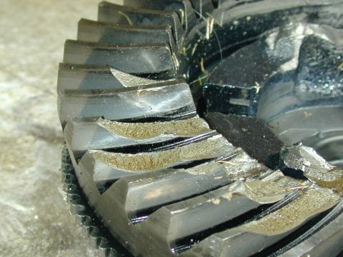 1996 Ford Bronco - Differential gear teeth show significant wear and damage.