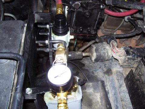 1992 Ford Bronco - Close-up of an air pressure gauge and regulator assembly, likely part of an aftermarket modification.