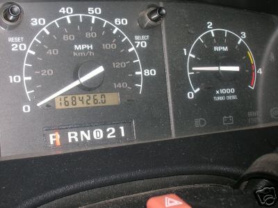 1995 Ford C-350 (Centurion Conversions) - The vehicle's dashboard displays the speedometer, tachometer, and odometer readings.
