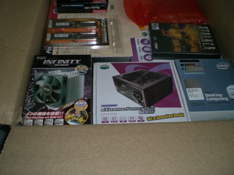 1995 Ford Probe - Various computer hardware components are arranged inside a cardboard box.