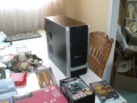1995 Ford Probe - A computer tower and various PC components are laid out on a table, suggesting a new build or upgrade.