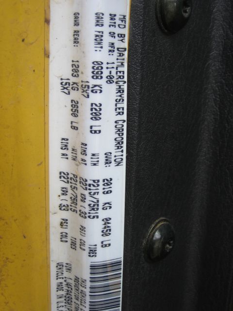 2001 Jeep Wrangler - This vehicle identification sticker details manufacturing date, weight ratings, and tire specifications.