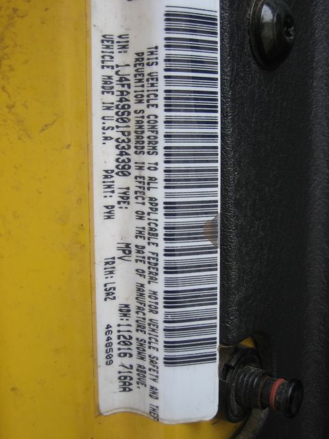 2001 Jeep Wrangler - A close-up of a vehicle's VIN sticker, providing identification details.