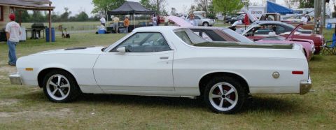 1976 Ford Ranchero - Side view of a white 1976 Ford Ranchero pickup truck at an outdoor event.