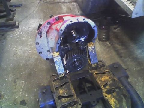 1992 Ford Bronco - Differential housing and gears are visible, mounted on a stand in a workshop.
