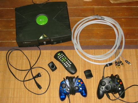 1996 Ford Bronco - This photo shows an original Xbox console with its accessories, including controllers and cables.