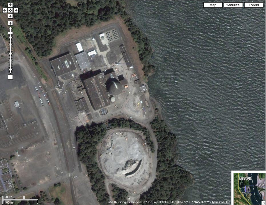 Google Maps satellite screenshot of a riverside power plant site with demolished cooling tower