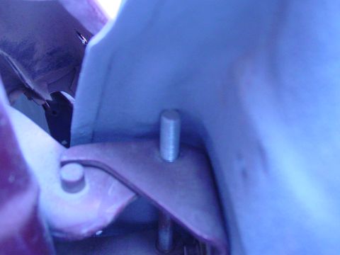 1979 Ford Bronco - A metal bracket and bolt are visible inside the vehicle's cabin.