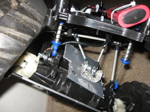 1990 Ford Bronco - The intricate suspension and drive system of a remote control vehicle is shown in detail.
