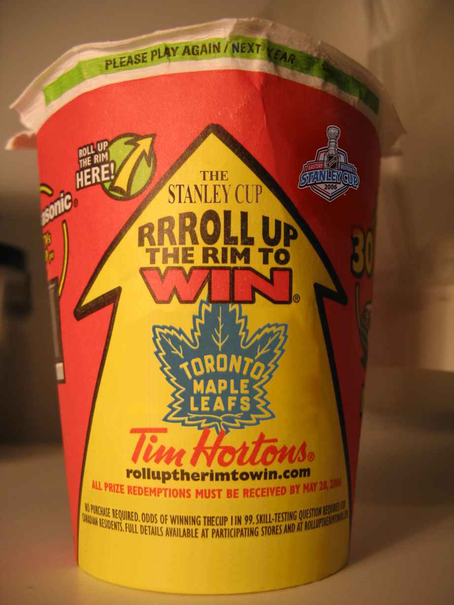 Red and yellow Tim Hortons cup with Toronto Maple Leafs logo and Stanley Cup promotion