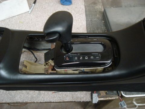 1992 Ford Crown Victoria - Close-up of an automatic transmission shifter assembly, showing gear selection indicators.